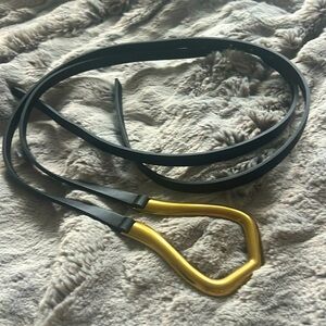 Black and brass belt